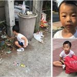 thai boy collecting trash